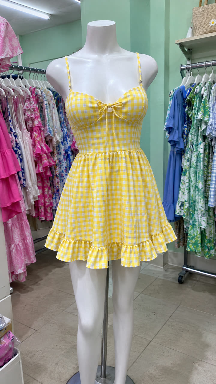 Wednesday outfit: yellow gingham sundress on a mannequin